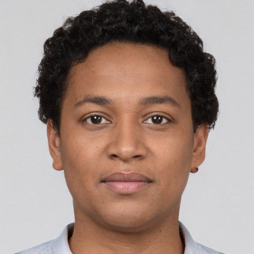 Neutral latino young-adult male with short  brown hair and brown eyes
