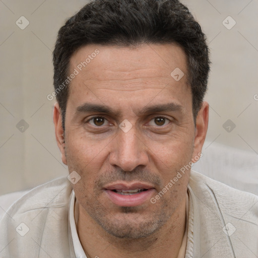 Joyful white adult male with short  brown hair and brown eyes