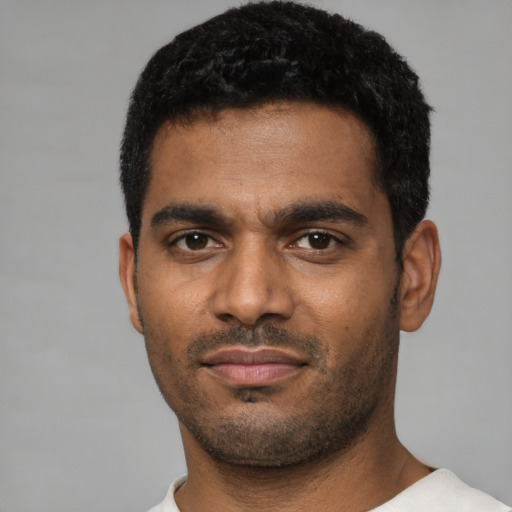 Neutral black young-adult male with short  black hair and brown eyes