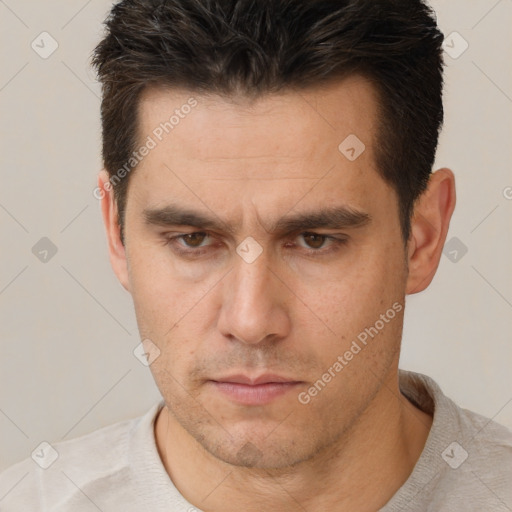 Neutral white adult male with short  brown hair and brown eyes