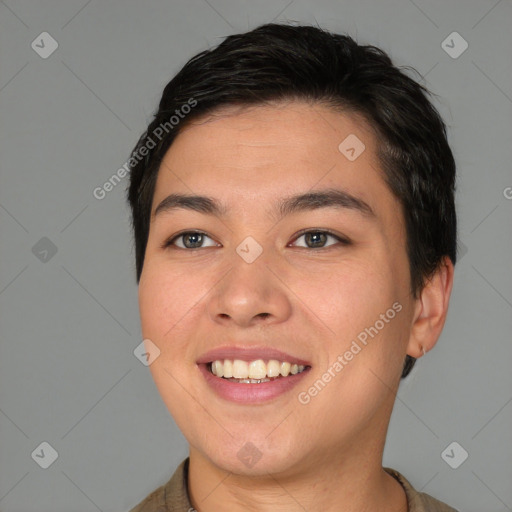 Joyful asian young-adult female with short  brown hair and brown eyes