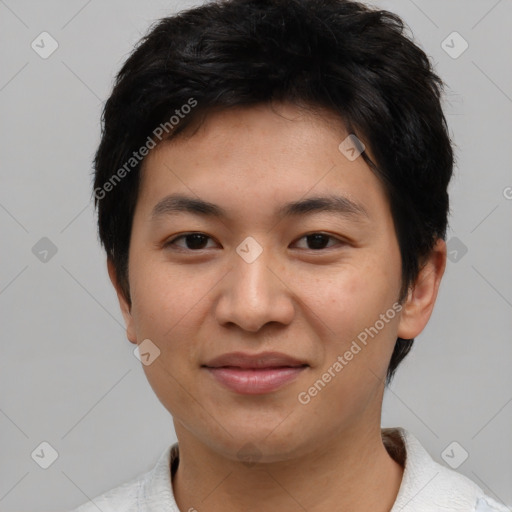 Joyful asian young-adult male with short  black hair and brown eyes