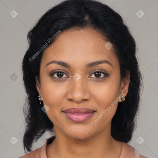 Joyful black young-adult female with medium  black hair and brown eyes