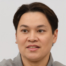 Joyful white adult female with short  brown hair and brown eyes