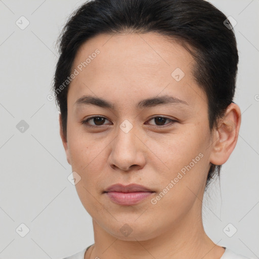 Joyful white young-adult female with short  brown hair and brown eyes