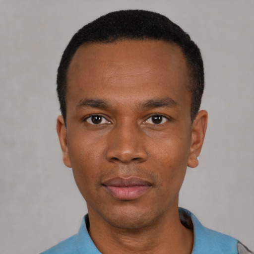 Neutral black young-adult male with short  black hair and brown eyes
