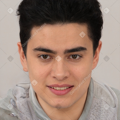 Joyful latino young-adult male with short  brown hair and brown eyes