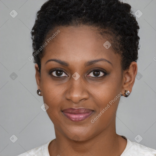 Joyful black young-adult female with short  brown hair and brown eyes