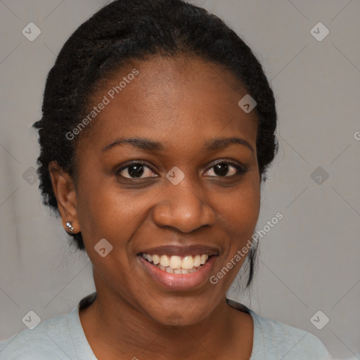 Joyful black young-adult female with medium  black hair and brown eyes