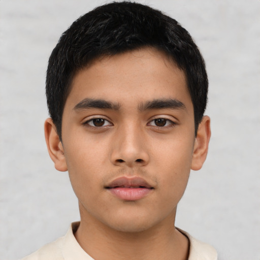 Neutral asian child male with short  black hair and brown eyes