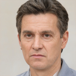 Neutral white middle-aged male with short  brown hair and brown eyes