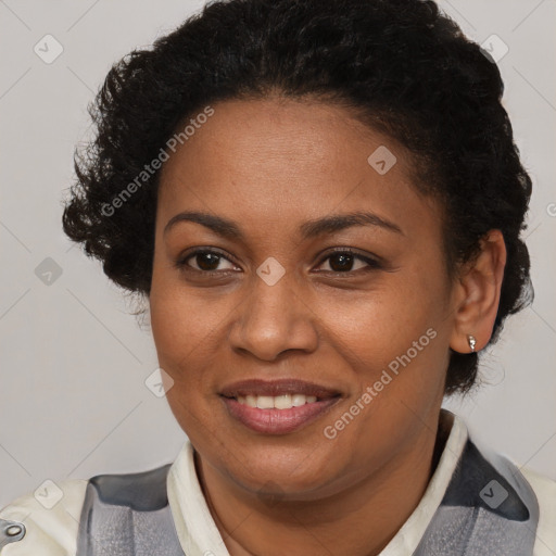 Joyful black adult female with short  brown hair and brown eyes