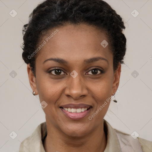 Joyful black young-adult female with short  brown hair and brown eyes