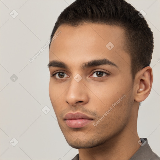 Neutral white young-adult male with short  black hair and brown eyes