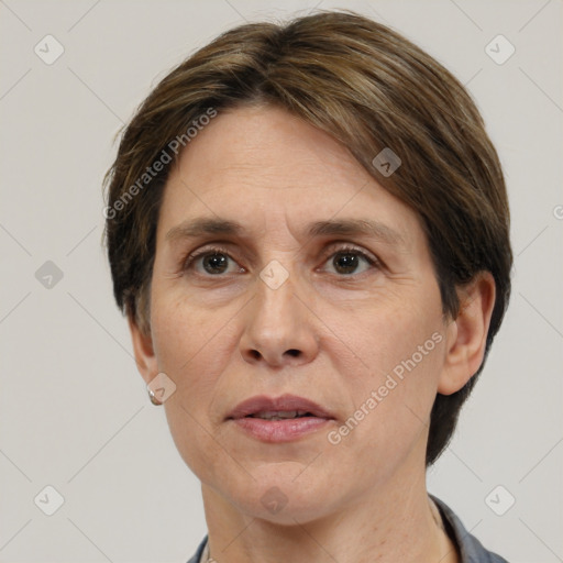 Joyful white adult female with short  brown hair and brown eyes