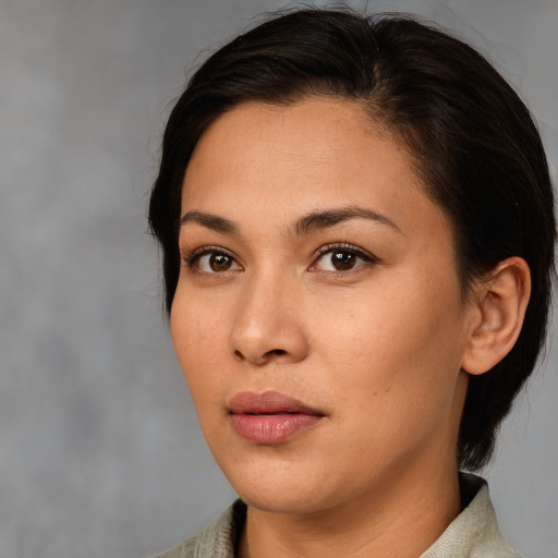 Neutral white young-adult female with medium  brown hair and brown eyes