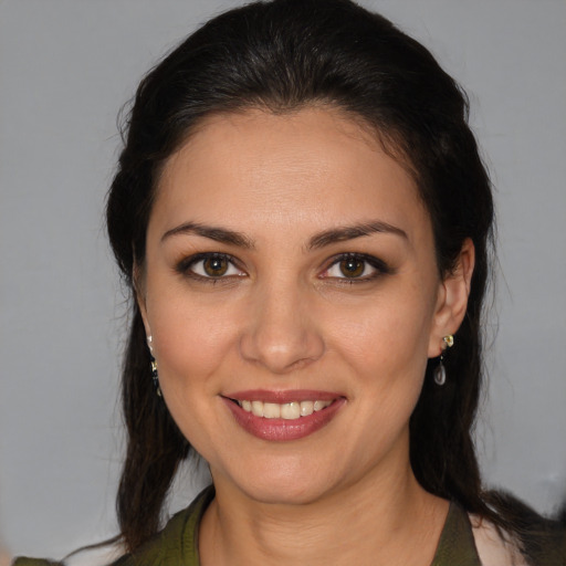 Joyful white young-adult female with medium  brown hair and brown eyes