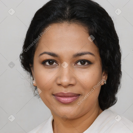 Joyful latino young-adult female with medium  brown hair and brown eyes