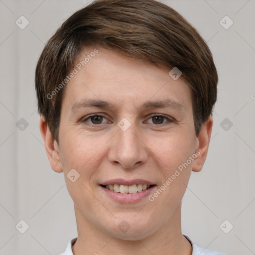 Joyful white young-adult female with short  brown hair and brown eyes