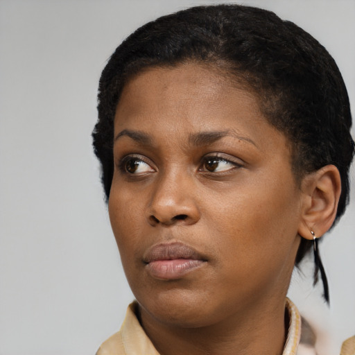 Neutral black young-adult female with short  brown hair and brown eyes
