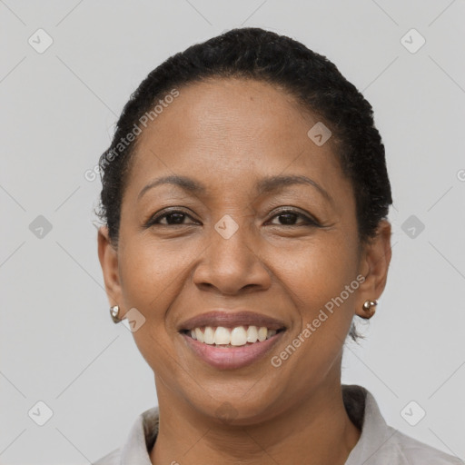 Joyful latino young-adult female with short  brown hair and brown eyes