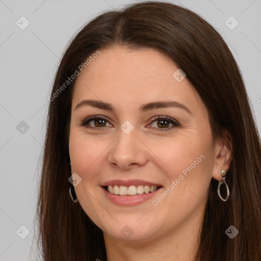 Joyful white young-adult female with long  brown hair and brown eyes