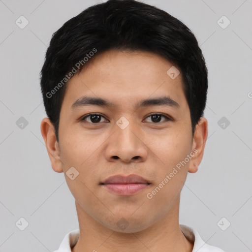 Joyful asian young-adult male with short  black hair and brown eyes