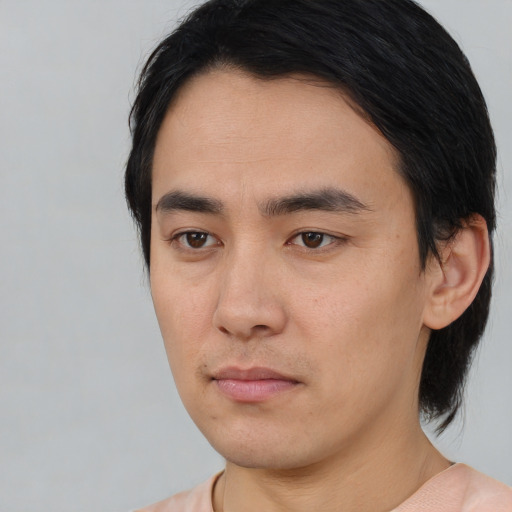 Neutral white young-adult male with medium  black hair and brown eyes