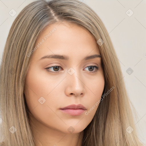 Neutral white young-adult female with long  brown hair and brown eyes