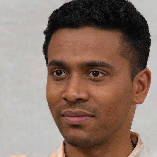 Neutral latino young-adult male with short  black hair and brown eyes