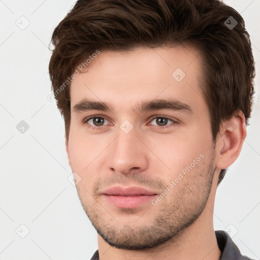 Neutral white young-adult male with short  brown hair and brown eyes