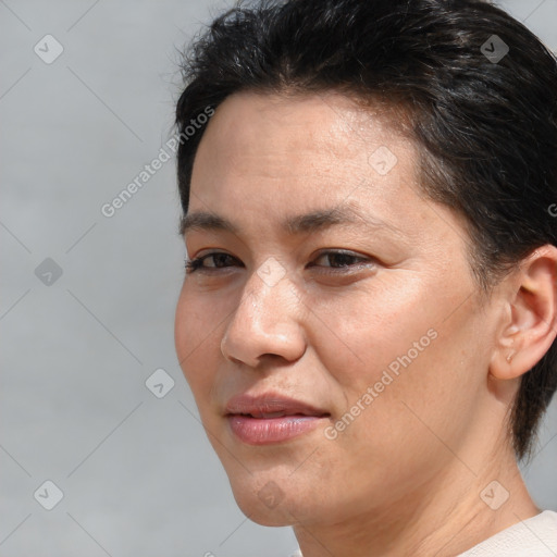 Joyful white adult female with short  brown hair and brown eyes