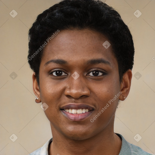 Joyful black young-adult female with short  black hair and brown eyes