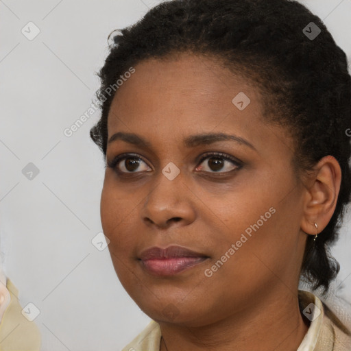 Neutral black young-adult female with short  brown hair and brown eyes