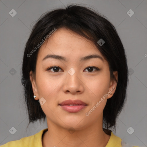 Joyful asian young-adult female with medium  brown hair and brown eyes