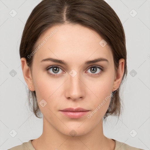 Neutral white young-adult female with medium  brown hair and grey eyes