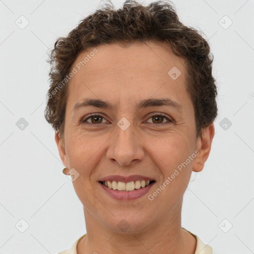 Joyful white adult female with short  brown hair and brown eyes