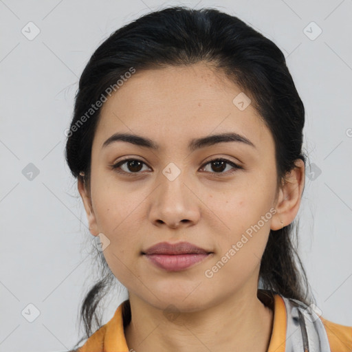 Joyful latino young-adult female with medium  black hair and brown eyes