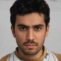 Neutral white young-adult male with short  black hair and brown eyes