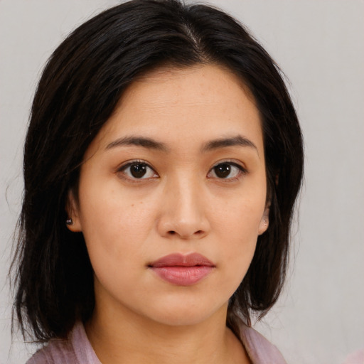 Neutral asian young-adult female with medium  black hair and brown eyes