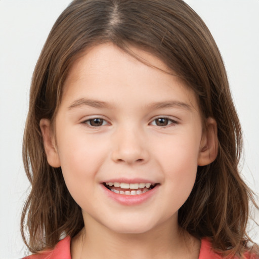 Joyful white child female with medium  brown hair and brown eyes