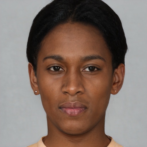 Neutral black young-adult female with short  black hair and brown eyes