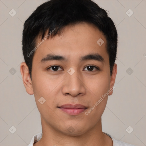 Joyful asian young-adult male with short  black hair and brown eyes