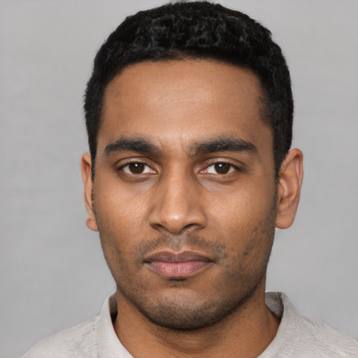 Neutral latino young-adult male with short  black hair and brown eyes