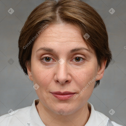 Joyful white adult female with medium  brown hair and brown eyes