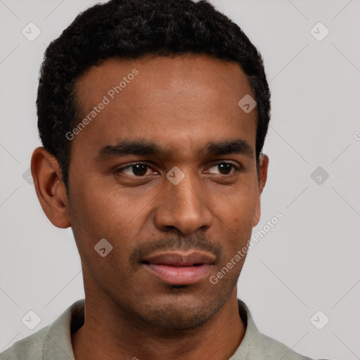Neutral black young-adult male with short  black hair and brown eyes