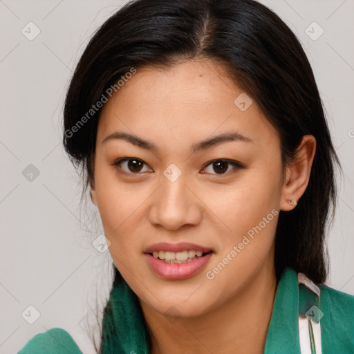 Joyful asian young-adult female with medium  brown hair and brown eyes