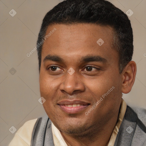 Joyful latino young-adult male with short  black hair and brown eyes