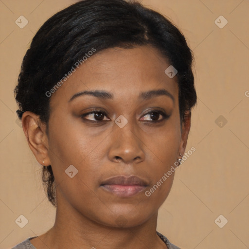 Neutral black young-adult female with medium  black hair and brown eyes