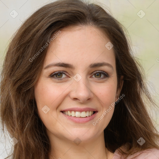 Joyful white young-adult female with long  brown hair and green eyes